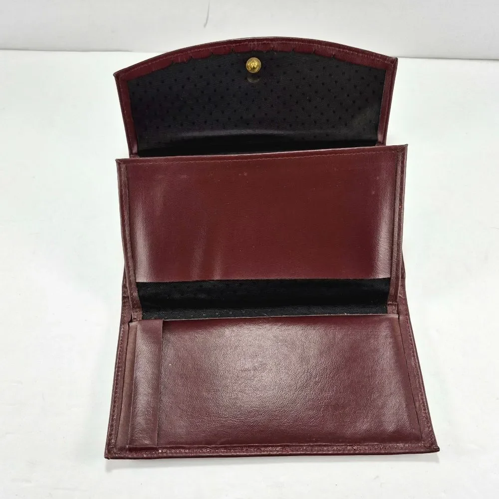 Vintage Full-Grain Cowhide Checkbook-Style Wallet With A Snap Closure.